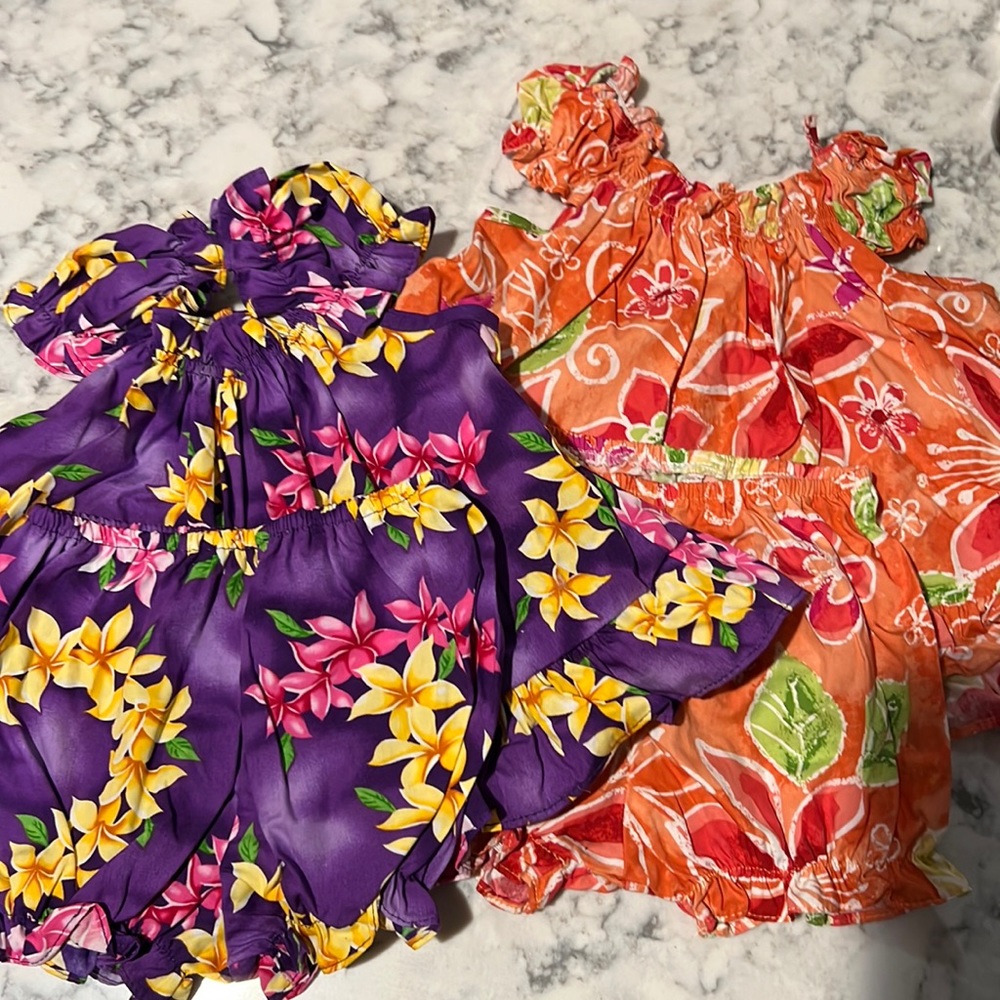 Two baby Hawaiian dresses sizes 12 and 18 months